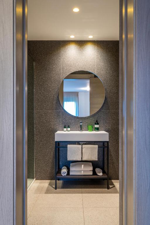 Koupelna v ubytování Hub Hotel