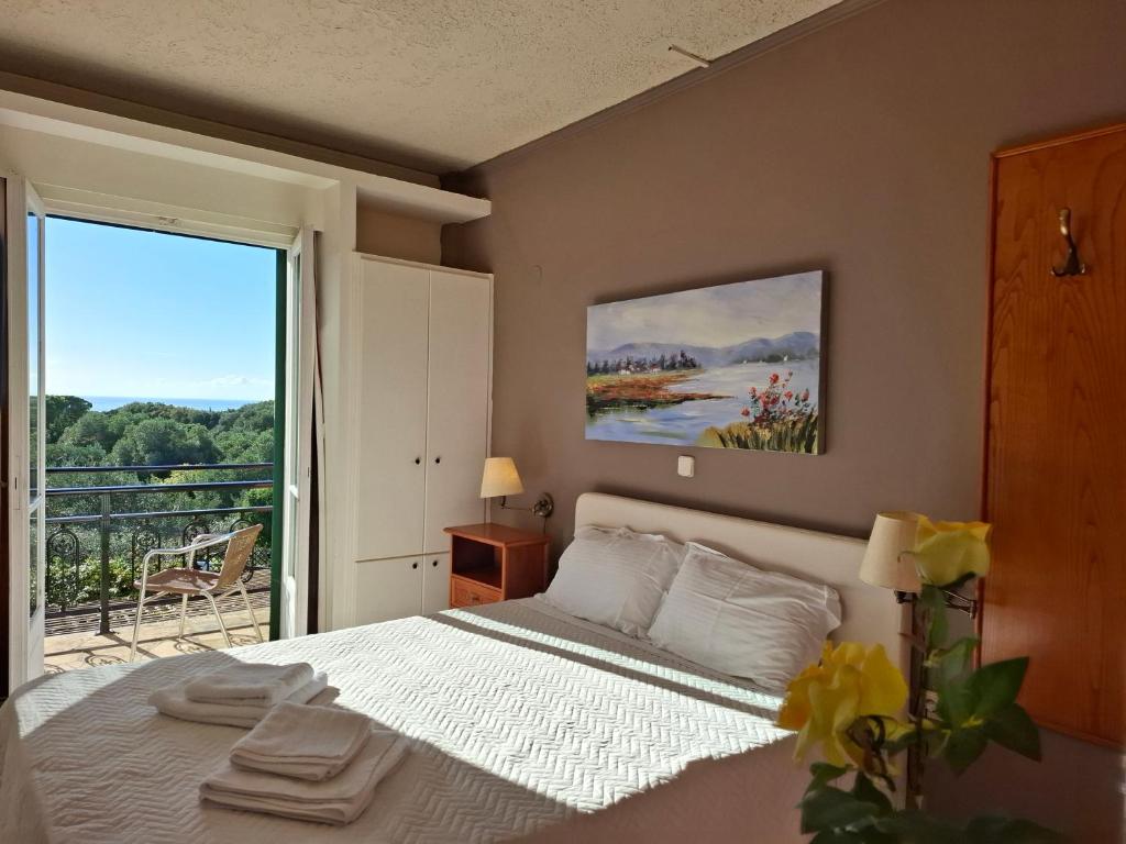 Postel nebo postele na pokoji v ubytování Sunrise Inn