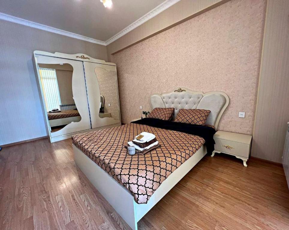 Llit o llits en una habitació de Standard Apartment Residence