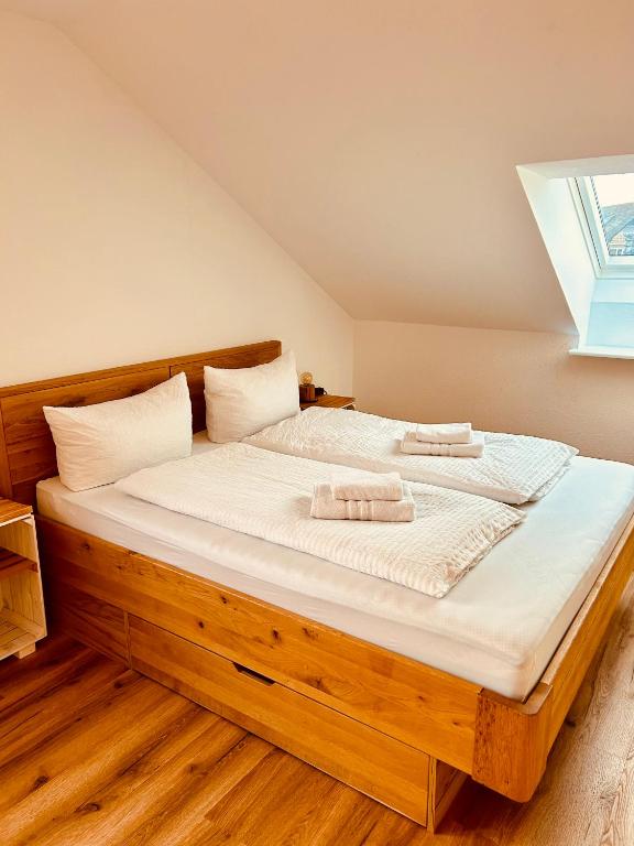 Postel nebo postele na pokoji v ubytování Apartments La Rosa