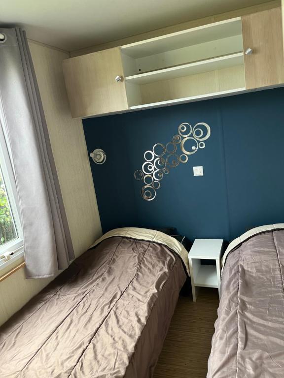 Postel nebo postele na pokoji v ubytování Mobile home