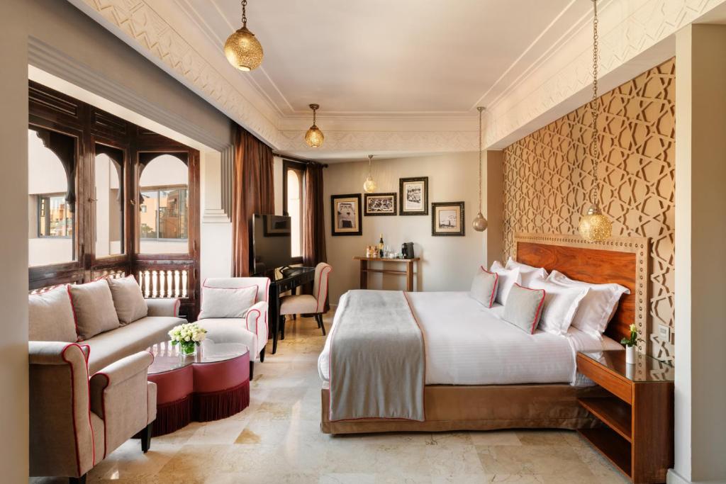 Postel nebo postele na pokoji v ubytování Hivernage Hotel & Spa