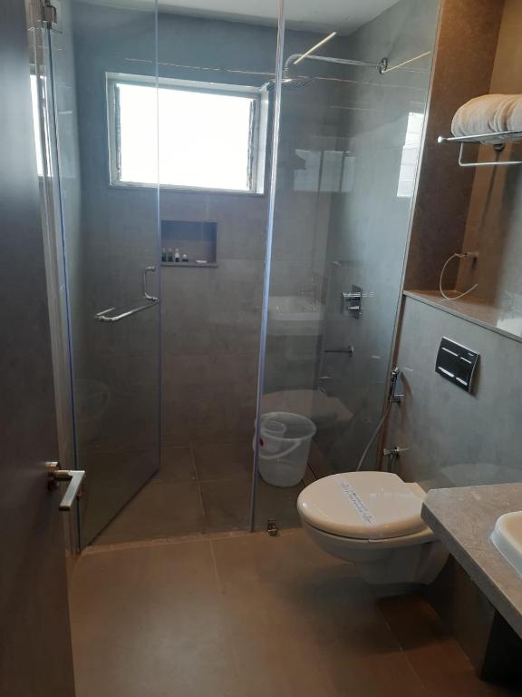 Koupelna v ubytování RATHNA RESIDENCY