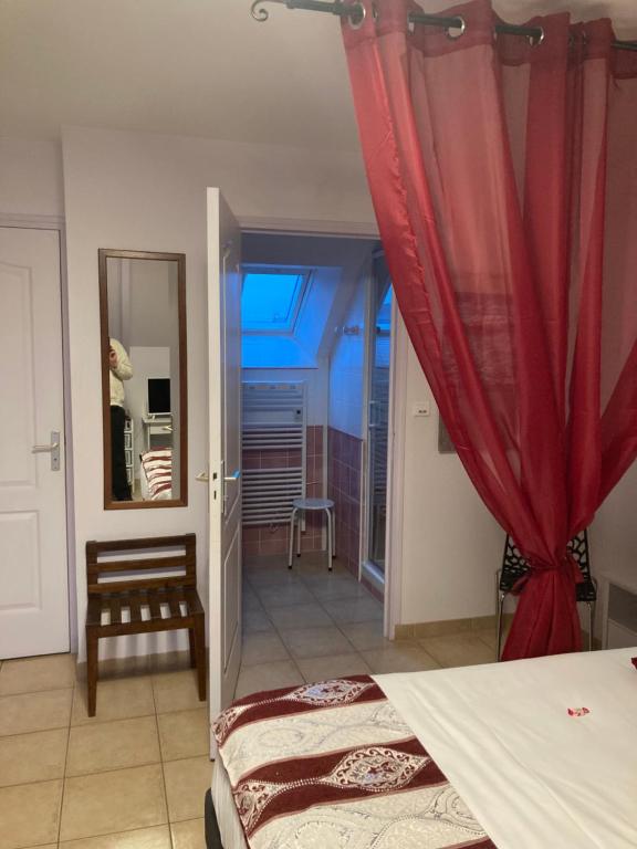 Postel nebo postele na pokoji v ubytování La Grande Mare