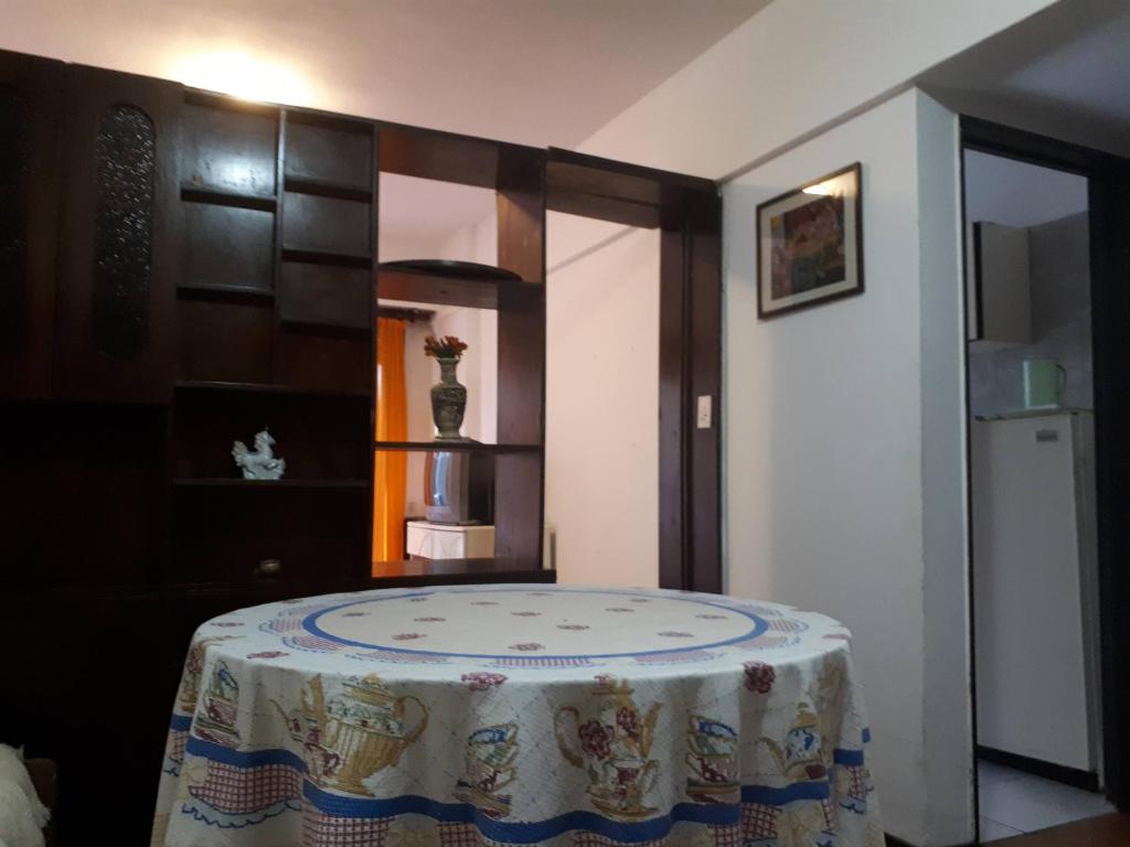 a room with a table with a table cloth on it at Susana in Mar del Plata