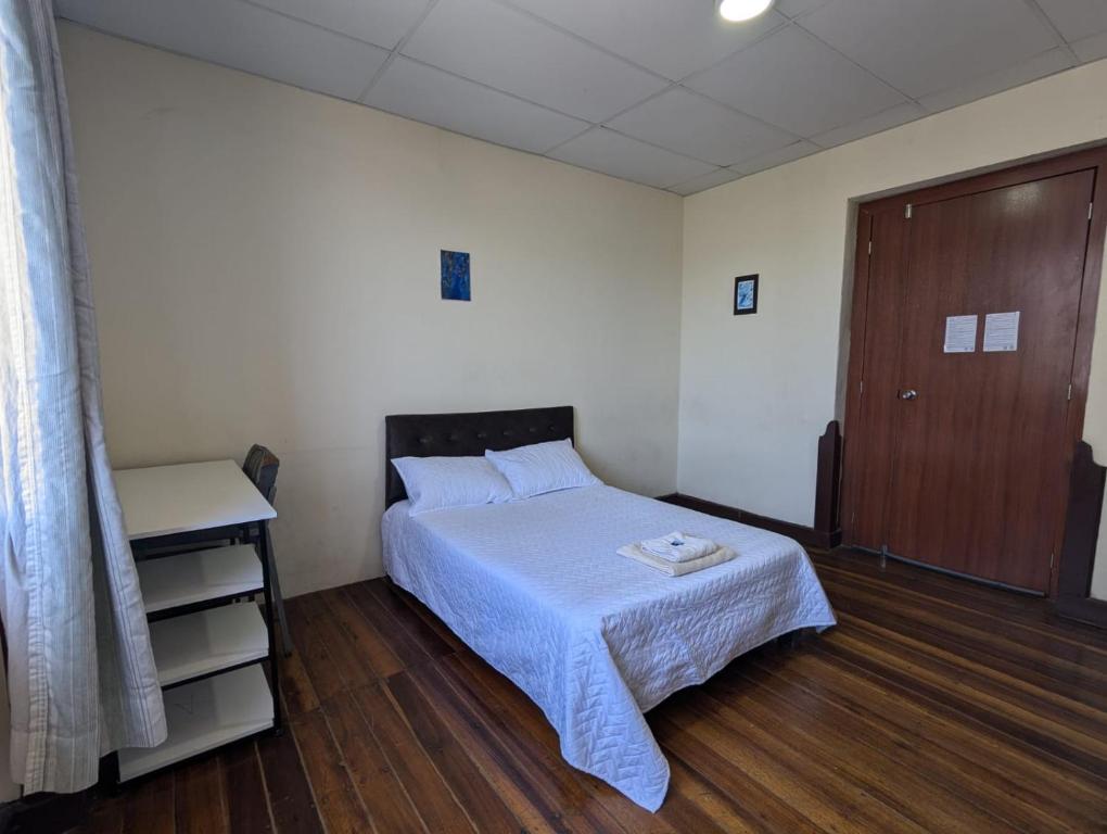 Postel nebo postele na pokoji v ubytování La Regina