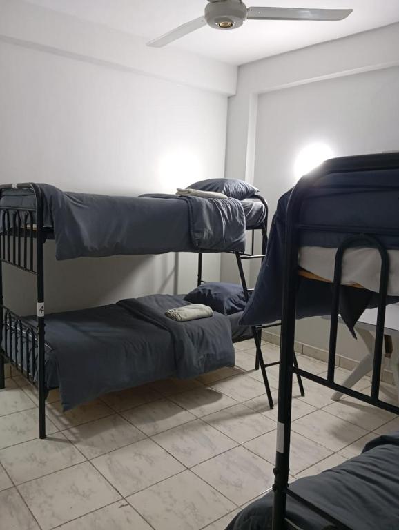 Postel nebo postele na pokoji v ubytování Abeer Guest House