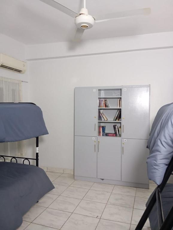 Postel nebo postele na pokoji v ubytování Abeer Guest House