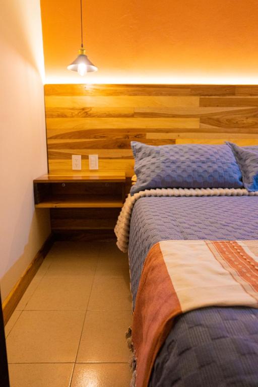 Postel nebo postele na pokoji v ubytování Casa Tsumbak