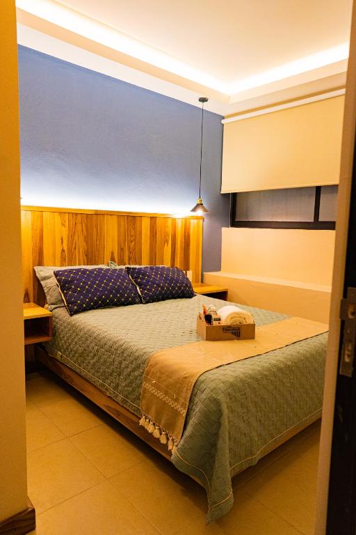 Postel nebo postele na pokoji v ubytování Casa Tsumbak