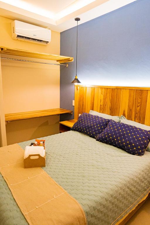 Postel nebo postele na pokoji v ubytování Casa Tsumbak