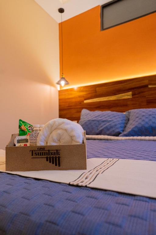 Postel nebo postele na pokoji v ubytování Casa Tsumbak