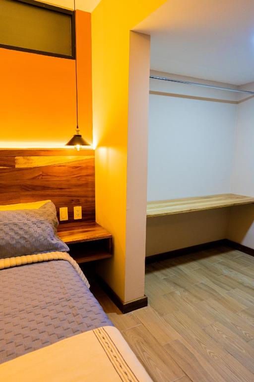 Postel nebo postele na pokoji v ubytování Casa Tsumbak