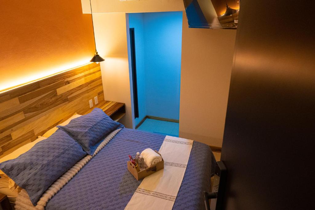 Postel nebo postele na pokoji v ubytování Casa Tsumbak