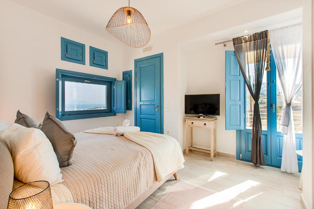 Postel nebo postele na pokoji v ubytování Santorini Garden Homes