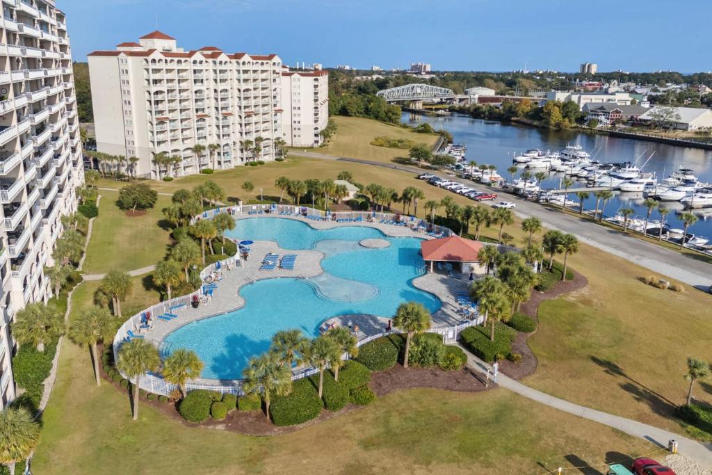 an aerial view of a resort with a large pool at Yacht Club Villas 1-505 - Marina View in Myrtle Beach