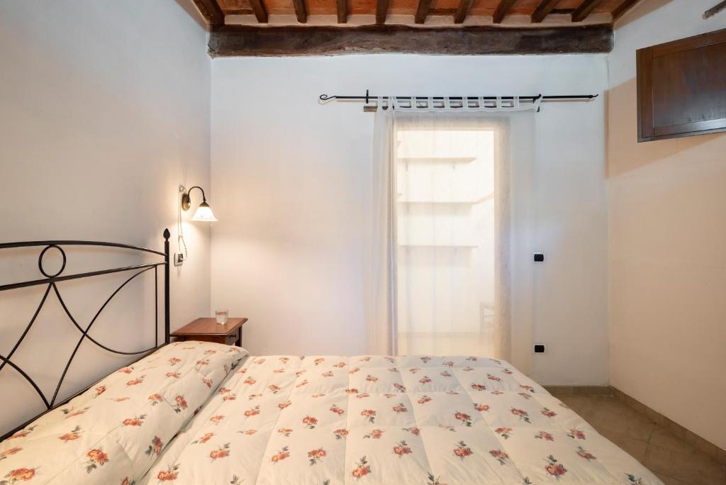 Postel nebo postele na pokoji v ubytování Relais Il Ciliegio