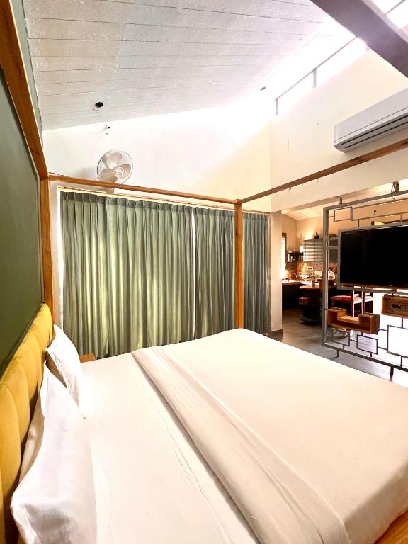 Postel nebo postele na pokoji v ubytování Rawai Luxury Tents Pushkar