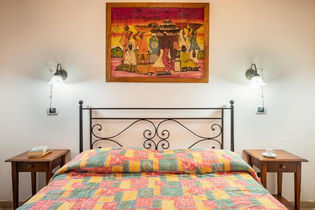Postel nebo postele na pokoji v ubytování Relais Il Ciliegio