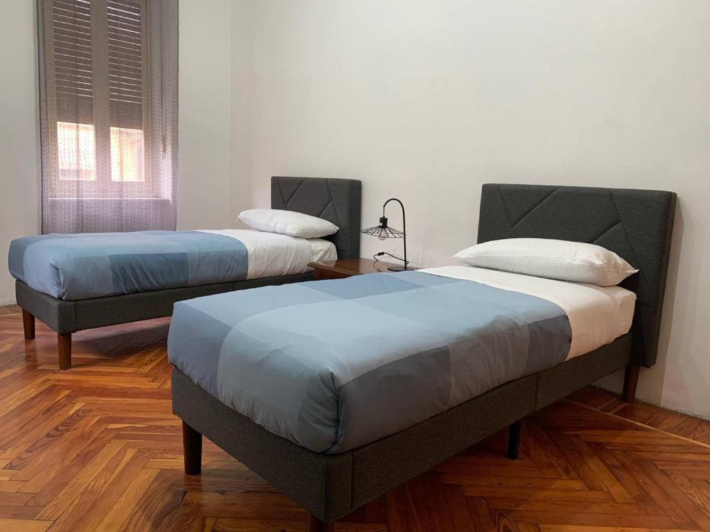 Ένα ή περισσότερα κρεβάτια σε δωμάτιο στο La Vecchia Barriera - Appartamento