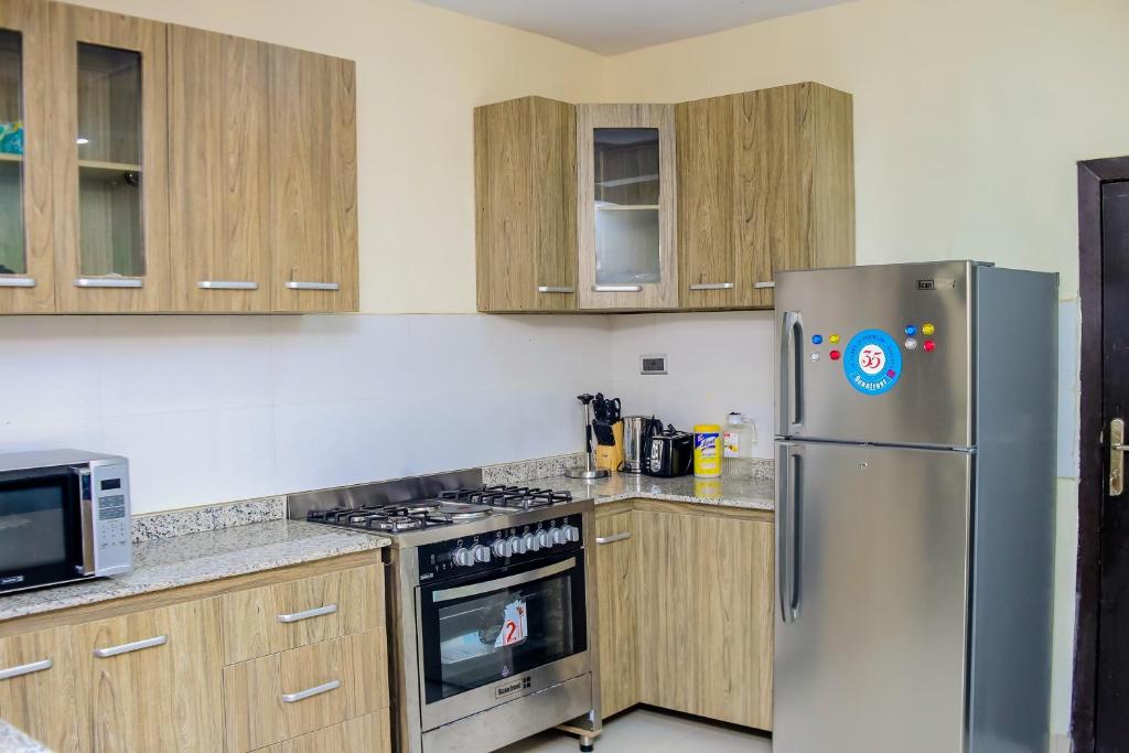 Kuchyň nebo kuchyňský kout v ubytování 4 Bedroom all ensuite "Milk & Honey" Home in Adeniyi Jones Ikeja