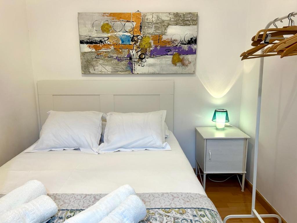 Posteľ alebo postele v izbe v ubytovaní Apartment carrer d'Olesa