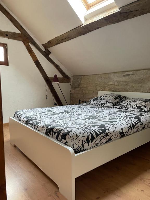 Postel nebo postele na pokoji v ubytování Dijon et alentours