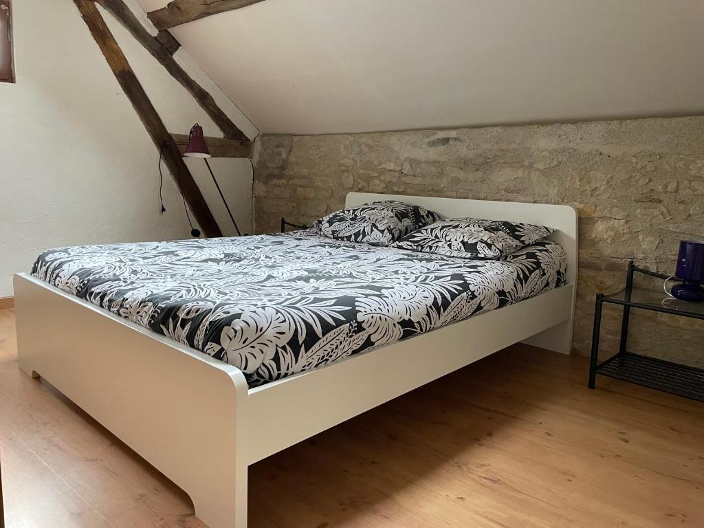 Postel nebo postele na pokoji v ubytování Dijon et alentours