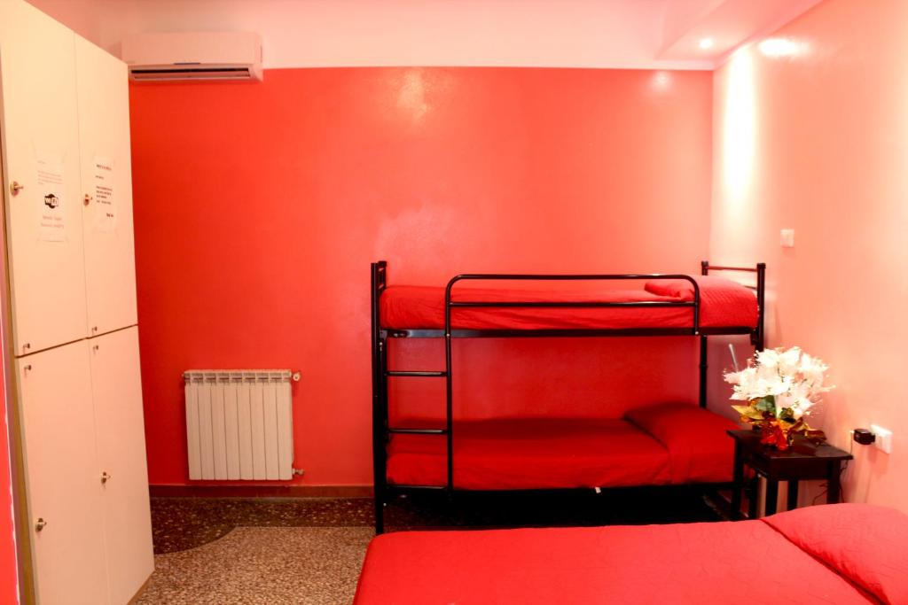 Postel nebo postele na pokoji v ubytování Legend R.G.
