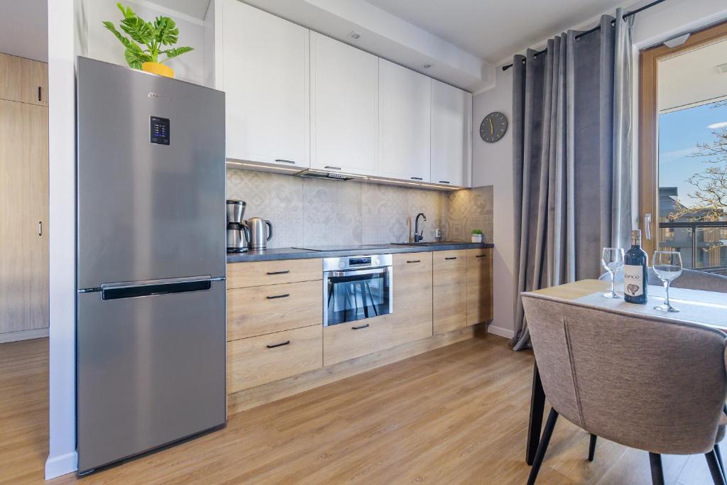 Kuchyňa alebo kuchynka v ubytovaní Amber Baltic Apartment