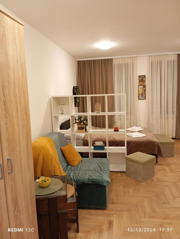 Postel nebo postele na pokoji v ubytování Apartman Vuk