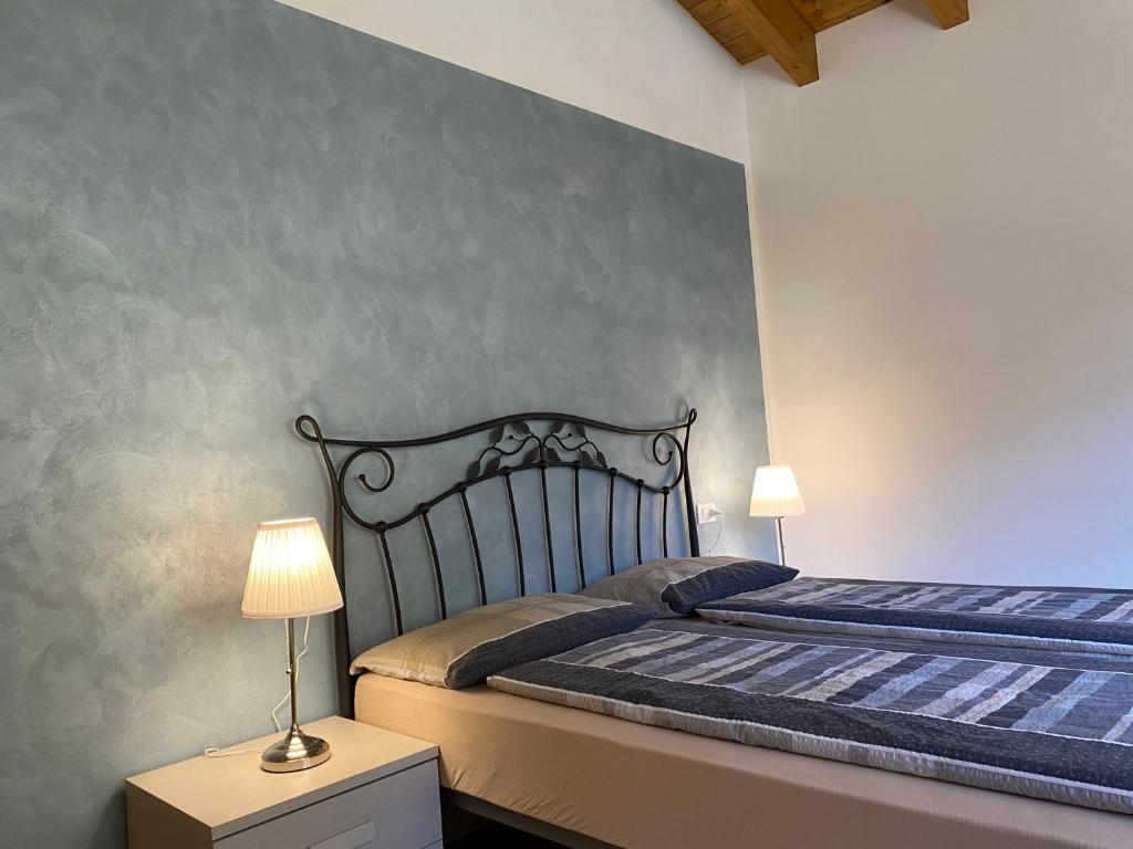 Postel nebo postele na pokoji v ubytování Villa Carlotta