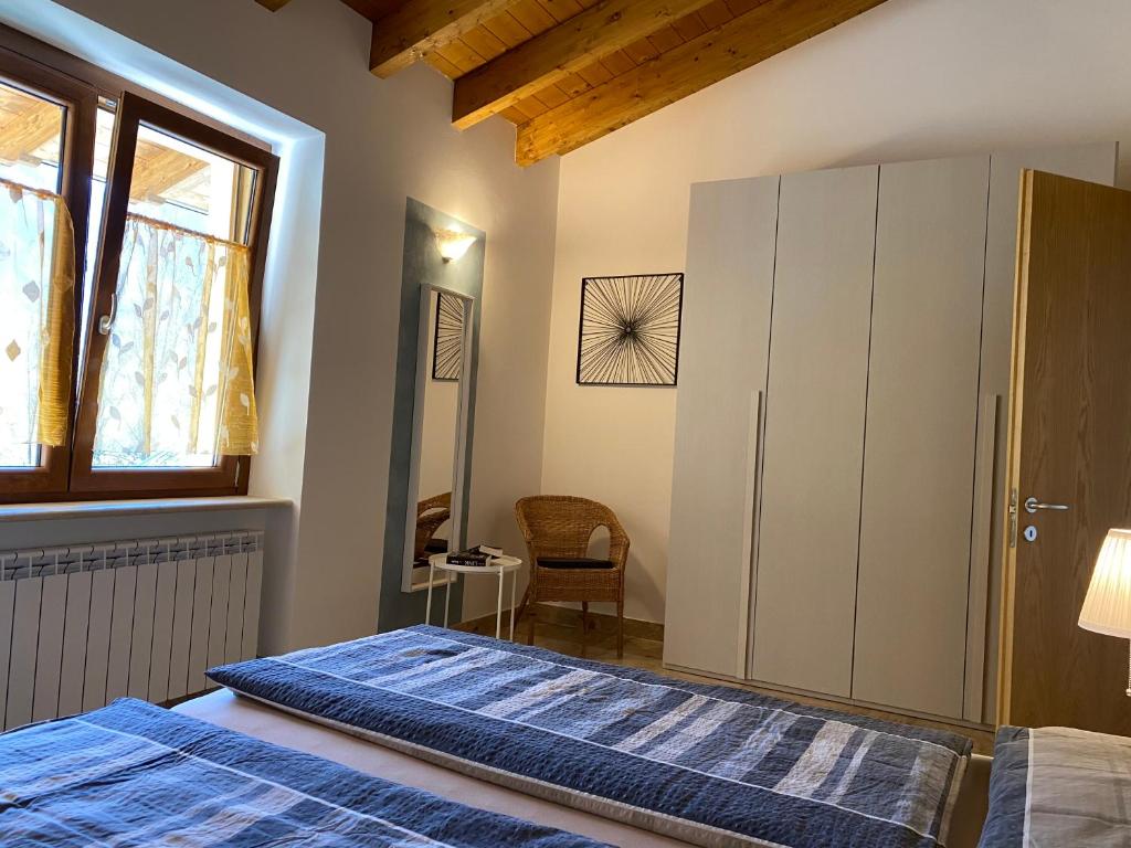 Postel nebo postele na pokoji v ubytování Villa Carlotta