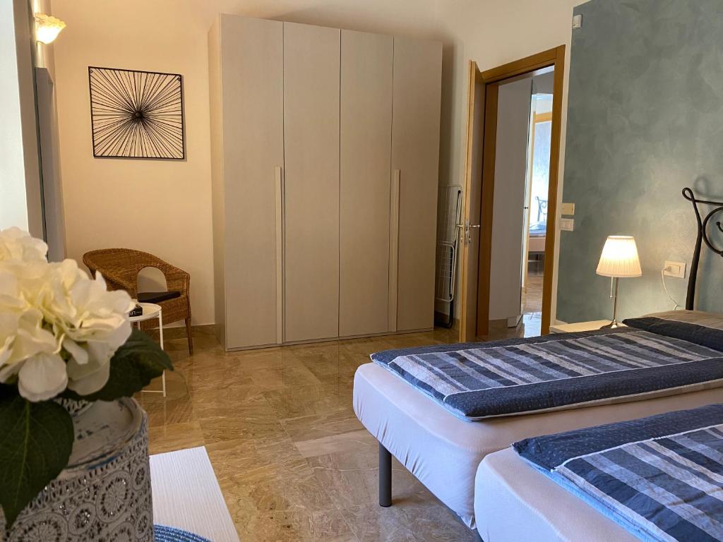 Postel nebo postele na pokoji v ubytování Villa Carlotta
