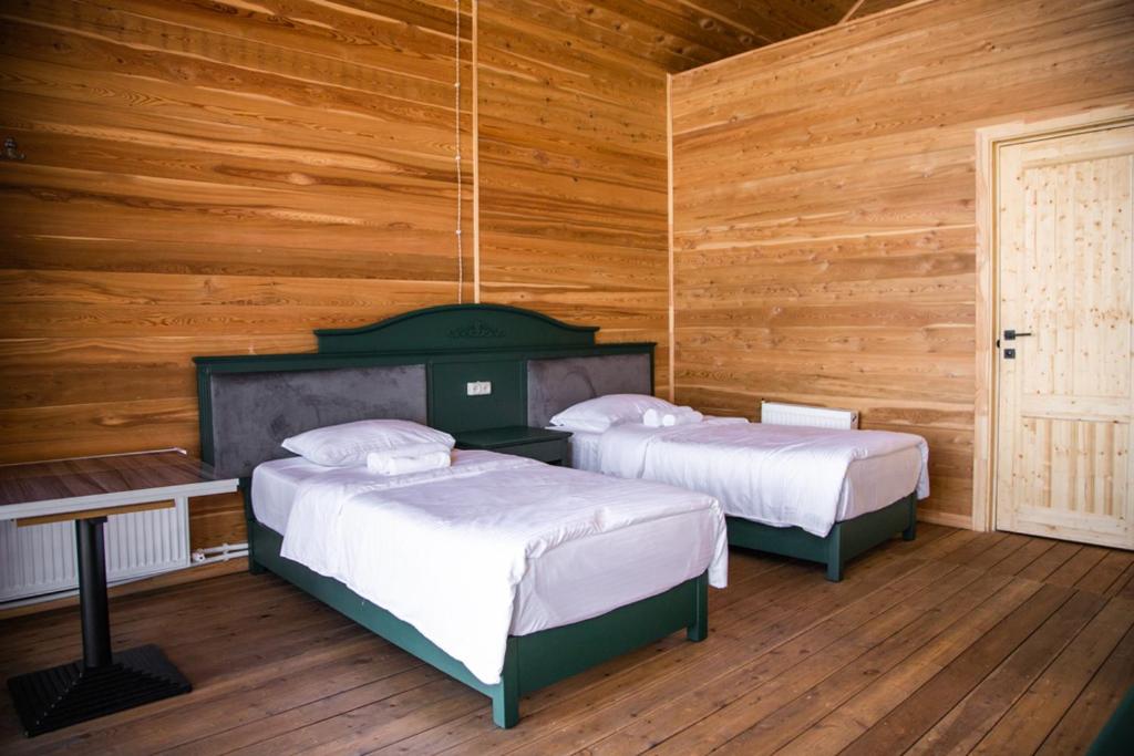 Postel nebo postele na pokoji v ubytování All Seasons Sevan
