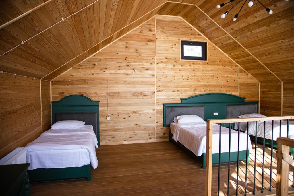 Postel nebo postele na pokoji v ubytování All Seasons Sevan