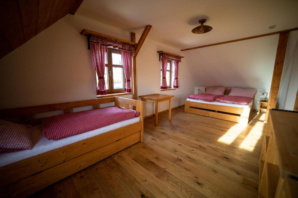 Postel nebo postele na pokoji v ubytování Chalupa Loveč