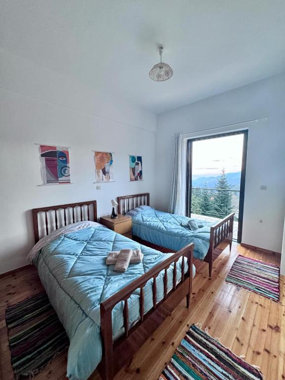 Postel nebo postele na pokoji v ubytování Casa de PavL-2