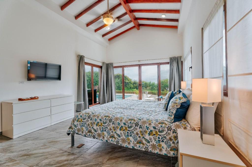 Postel nebo postele na pokoji v ubytování Casa Calma