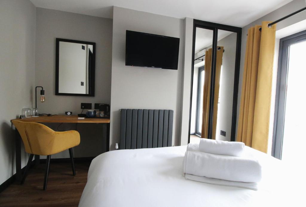 Postel nebo postele na pokoji v ubytování Park Lane Rooms