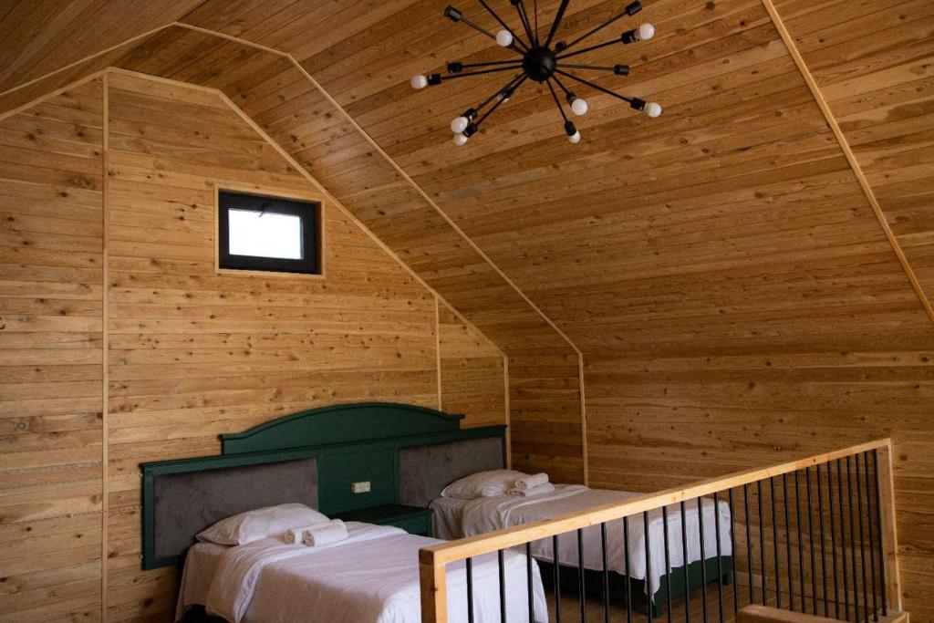 Postel nebo postele na pokoji v ubytování All Seasons Sevan
