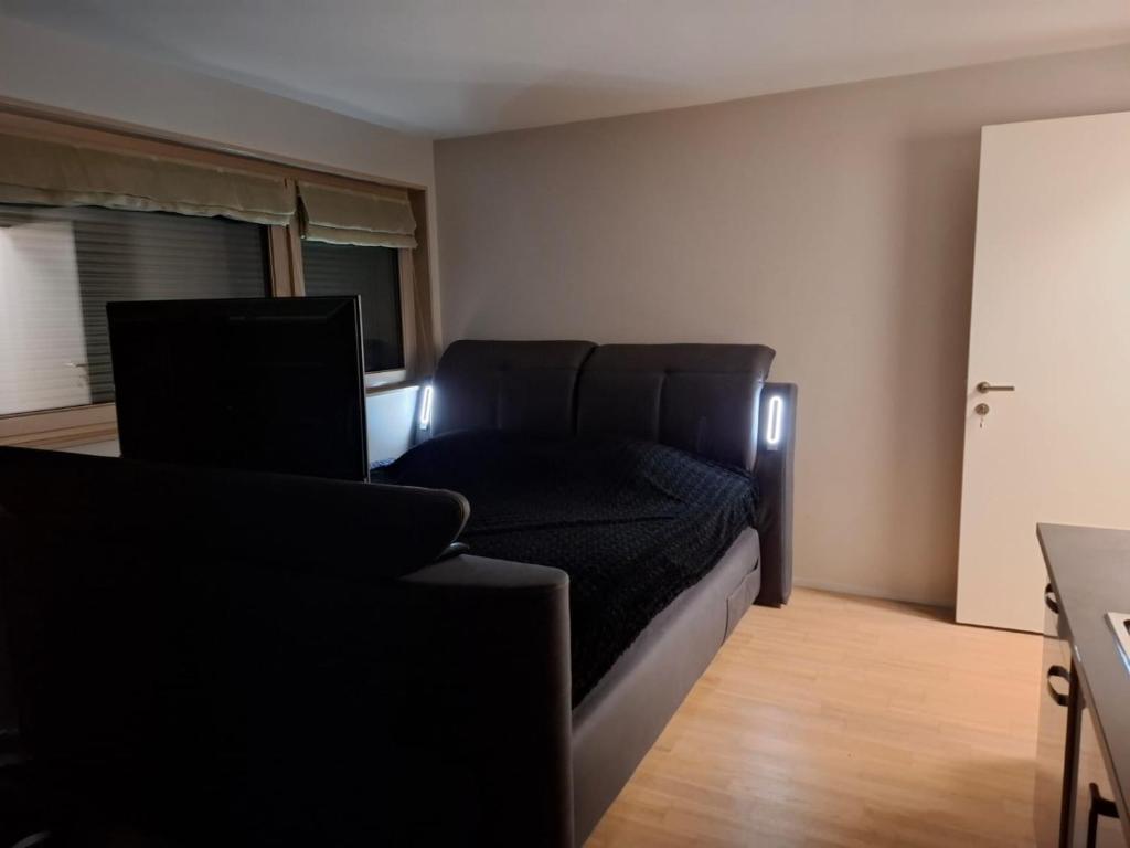 Posezení v ubytování Studio avec sauna privé