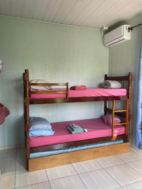Postel nebo postele na pokoji v ubytování Hotel Pousada e Parada Colonial