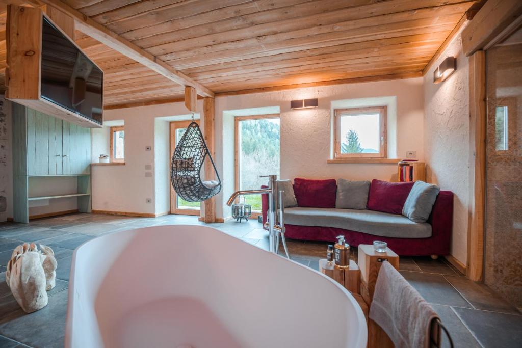 Postel nebo postele na pokoji v ubytování Chalet Noèr