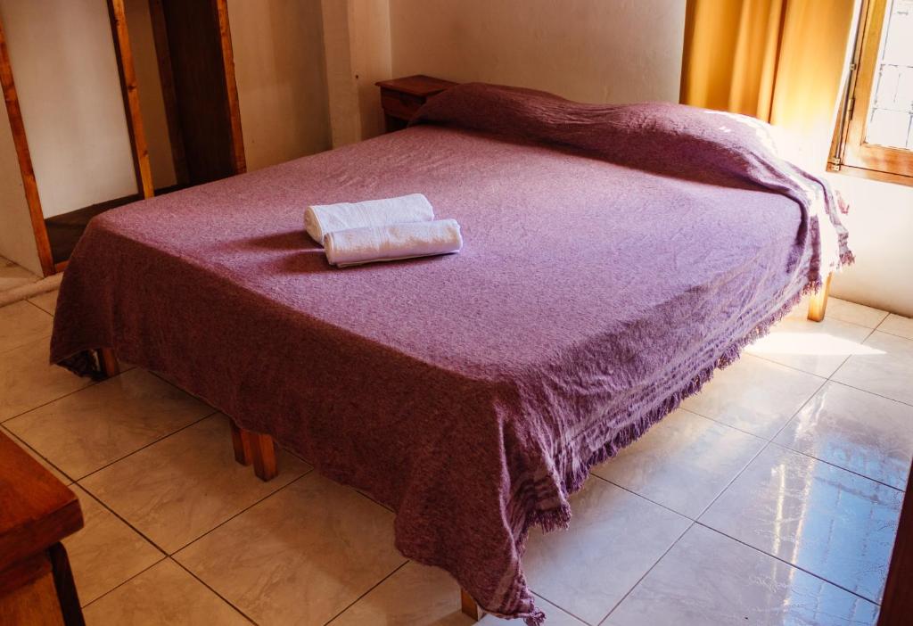 Postel nebo postele na pokoji v ubytování SIGRUM Hostel