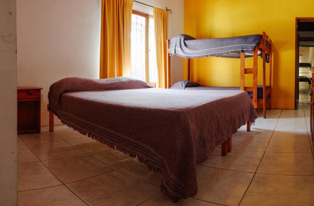 Postel nebo postele na pokoji v ubytování SIGRUM Hostel