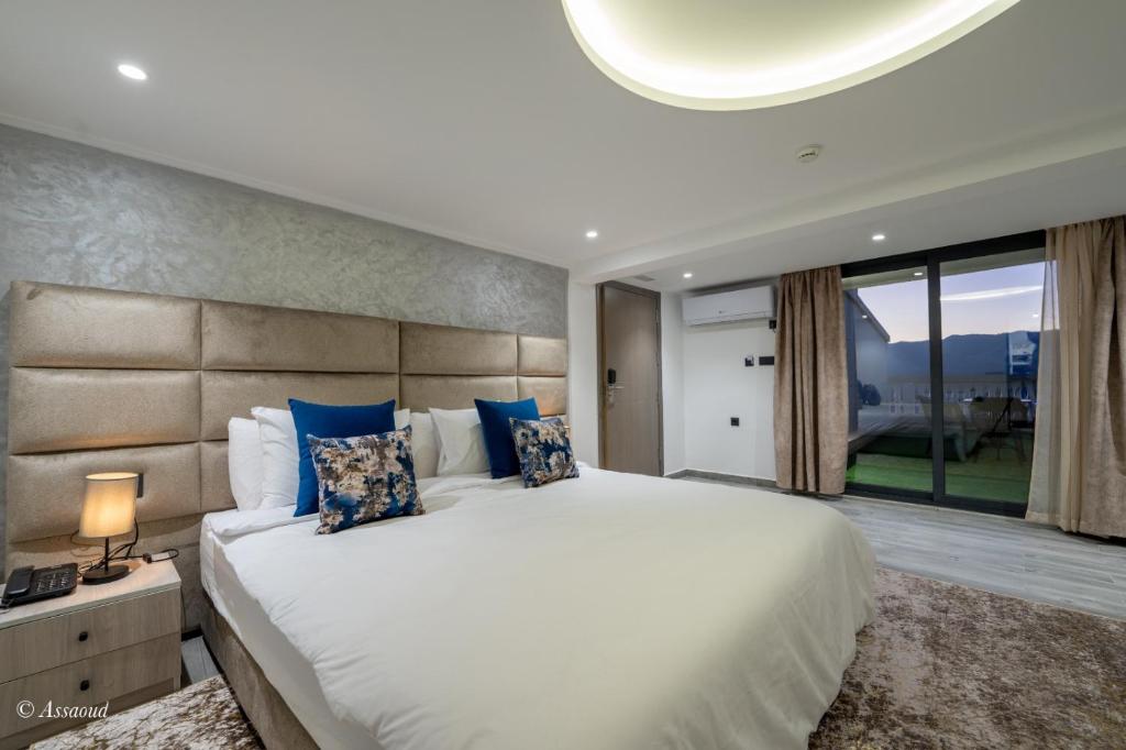 Postel nebo postele na pokoji v ubytování Luxury Chaouen