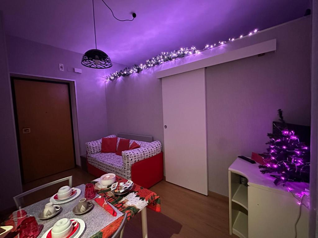 Postel nebo postele na pokoji v ubytování B&B Le Colombine