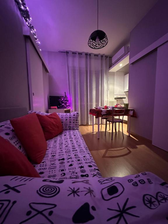 Postel nebo postele na pokoji v ubytování B&B Le Colombine