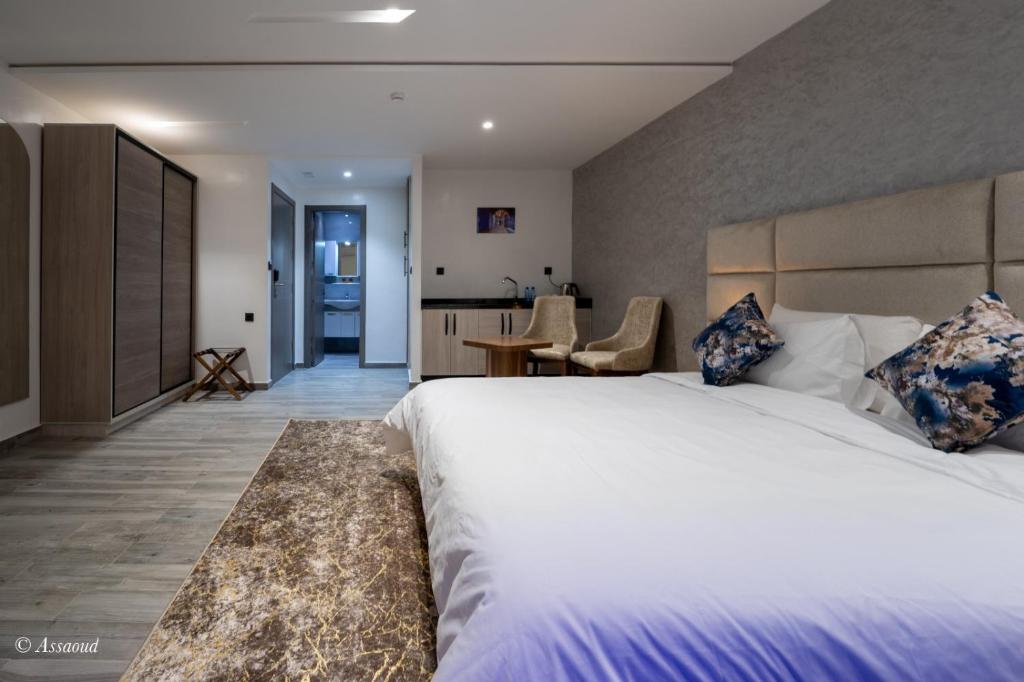 Postel nebo postele na pokoji v ubytování Luxury Chaouen